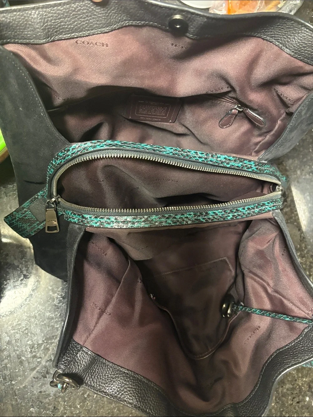 Black Leather Coach Dalton 31 with teal green snake print trim